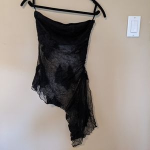 Sheer asymmetrical tube top